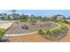 Community playground with various play structures and landscaped areas, perfect for Gathering fun at 2693 Leafwing Ct, Palm Harbor, FL 34683