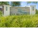 The Silver Ridge community sign features attractive signage surrounded by lush landscaping at 2693 Leafwing Ct, Palm Harbor, FL 34683