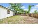 Backyard featuring grass and a wood fence at 2921 N 18Th St, Tampa, FL 33605