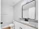 Modern bathroom features granite countertops and updated fixtures at 2921 N 18Th St, Tampa, FL 33605