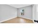 Bedroom with hardwood floors, natural light, and view of the backyard at 2921 N 18Th St, Tampa, FL 33605