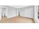 Bedroom with wood floors, closet and view to a bright bath at 2921 N 18Th St, Tampa, FL 33605