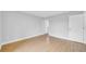 Neutral bedroom features laminate floors, with doors for closet and ensuite at 2921 N 18Th St, Tampa, FL 33605