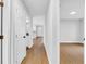 Hallway with wood floors connecting multiple rooms at 2921 N 18Th St, Tampa, FL 33605