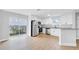 Modern kitchen with stainless steel appliances, white cabinets and wood floor at 2921 N 18Th St, Tampa, FL 33605