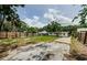 Large backyard with ample space for outdoor activities and gardening at 306 Banana St, Tarpon Springs, FL 34689
