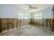 Bedroom with natural light, ceiling fan, and neutral paint at 306 Banana St, Tarpon Springs, FL 34689