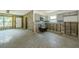 Bright, spacious kitchen featuring modern gray cabinets and large windows at 306 Banana St, Tarpon Springs, FL 34689