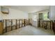 Kitchen area featuring neutral-toned tile flooring and a view of the exterior at 306 Banana St, Tarpon Springs, FL 34689