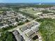Overhead view displays a community with pond access and proximity to various amenities at 3072 Inlet Breeze Way, Holiday, FL 34691