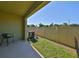 A backyard features a fenced-in yard with an AC unit at 3072 Inlet Breeze Way, Holiday, FL 34691