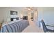 Spacious bedroom with ceiling fan and closet with an ensuite bathroom providing comfort and convenience at 3072 Inlet Breeze Way, Holiday, FL 34691