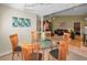 Elegant dining area with seating for six and easy access to the living room at 3079 Landmark Blvd # 1608, Palm Harbor, FL 34684
