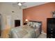 Comfortable main bedroom with ensuite bathroom and stylish accents at 3079 Landmark Blvd # 1608, Palm Harbor, FL 34684