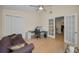 Cozy home office with French doors, closet, and dedicated workspace at 3079 Landmark Blvd # 1608, Palm Harbor, FL 34684