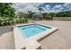 Tranquil community spa area with a clear blue hot tub and lounge seating for relaxation at 3079 Landmark Blvd # 1608, Palm Harbor, FL 34684