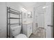 Bathroom with vanity, toilet, and built-in shelving for extra storage at 3123 Laird Dr, New Port Richey, FL 34655