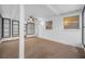 Cozy enclosed sunroom with ceiling fan offers a relaxing space with views to the outdoors at 3123 Laird Dr, New Port Richey, FL 34655