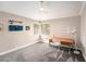 Well lit bedroom featuring modern carpeting and built-in overhead lighting at 3268 Tanglewood Trl, Palm Harbor, FL 34685