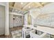 Dining room features custom cabinetry, modern light fixtures, and textured art at 344 Capri Blvd, Treasure Island, FL 33706