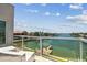 Enjoy stunning water views from this balcony, showcasing nearby homes and boat docks at 344 Capri Blvd, Treasure Island, FL 33706