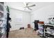 Carpeted bedroom with a ceiling fan and closet, ready for personalization at 3801 Carroway St, Tampa, FL 33619