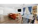 Bright living room area with modern decor, hardwood floors, and a large window offering ample natural light at 3801 Carroway St, Tampa, FL 33619