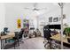 Bright home office with wood floors, dual desks, and ample natural light at 3801 Carroway St, Tampa, FL 33619