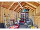 Interior of shed showing ample storage space, shelving, and various tools at 3801 Carroway St, Tampa, FL 33619