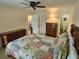Comfortable bedroom features a ceiling fan, bedroom furniture, and neutral color palette at 38225 Ironwood Pl # 38225, Zephyrhills, FL 33542