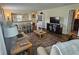 Comfortable living area with an open layout and ample space for relaxation and entertainment at 38225 Ironwood Pl # 38225, Zephyrhills, FL 33542