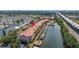 Aerial view of waterfront condos, with boat docks and bay access at 5000 Culbreath Key Way # 8-319, Tampa, FL 33611