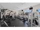 Well-equipped gym with treadmills, weight machines, and ample natural light for a healthy lifestyle at 5000 Culbreath Key Way # 8-319, Tampa, FL 33611