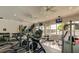 Well-equipped gym with various exercise machines, weights, and televisions for entertainment at 5000 Culbreath Key Way # 8-319, Tampa, FL 33611