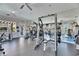 Spacious gym with modern weightlifting machines, mirrors, and ceiling fans for a complete workout experience at 5000 Culbreath Key Way # 8-319, Tampa, FL 33611