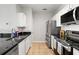 Well-equipped kitchen with stainless steel appliances and granite countertops offers modern convenience at 5000 Culbreath Key Way # 8-319, Tampa, FL 33611