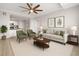 Bright living room featuring modern decor, neutral colors, and an open floor plan to the kitchen at 5000 Culbreath Key Way # 8-319, Tampa, FL 33611