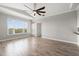 Bright living room featuring hard surface floors and a ceiling fan at 5000 Culbreath Key Way # 8-319, Tampa, FL 33611