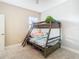 Charming bedroom featuring a bunk bed with a soft color scheme and plenty of space at 5807 Circa Fishhawk Blvd, Lithia, FL 33547