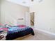 bedroom with carpet flooring, closet, ceiling fan, and Spiderman-themed bedding at 5807 Circa Fishhawk Blvd, Lithia, FL 33547