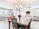 Bright dining area open to the living room and kitchen, creating an inviting space for entertaining at 5807 Circa Fishhawk Blvd, Lithia, FL 33547