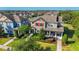 Charming two-story home with manicured landscaping, red shutters and a welcoming front porch at 5807 Circa Fishhawk Blvd, Lithia, FL 33547