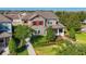 Attractive two-story home with red shutters, front porch, and manicured landscaping at 5807 Circa Fishhawk Blvd, Lithia, FL 33547