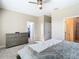 Spacious main bedroom featuring an ensuite bathroom and walk-in closet at 5807 Circa Fishhawk Blvd, Lithia, FL 33547