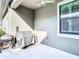 Covered patio with ceiling fan, great for outdoor grilling and dining at 5807 Circa Fishhawk Blvd, Lithia, FL 33547