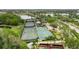 Aerial view of community tennis and pickleball courts and landscaping at 624 Balibay Rd, Apollo Beach, FL 33572