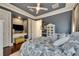 This beautiful bedroom includes a TV area, hardwood floors, and neutral colors at 624 Balibay Rd, Apollo Beach, FL 33572