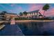 Waterfront clubhouse featuring a large dock, perfect for boating and enjoying waterfront activities at 624 Balibay Rd, Apollo Beach, FL 33572