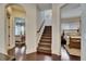 Hallway with access to two bedrooms and stairway at 624 Balibay Rd, Apollo Beach, FL 33572