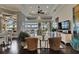 Spacious living room boasts natural light, dark wood floors, and water views at 624 Balibay Rd, Apollo Beach, FL 33572